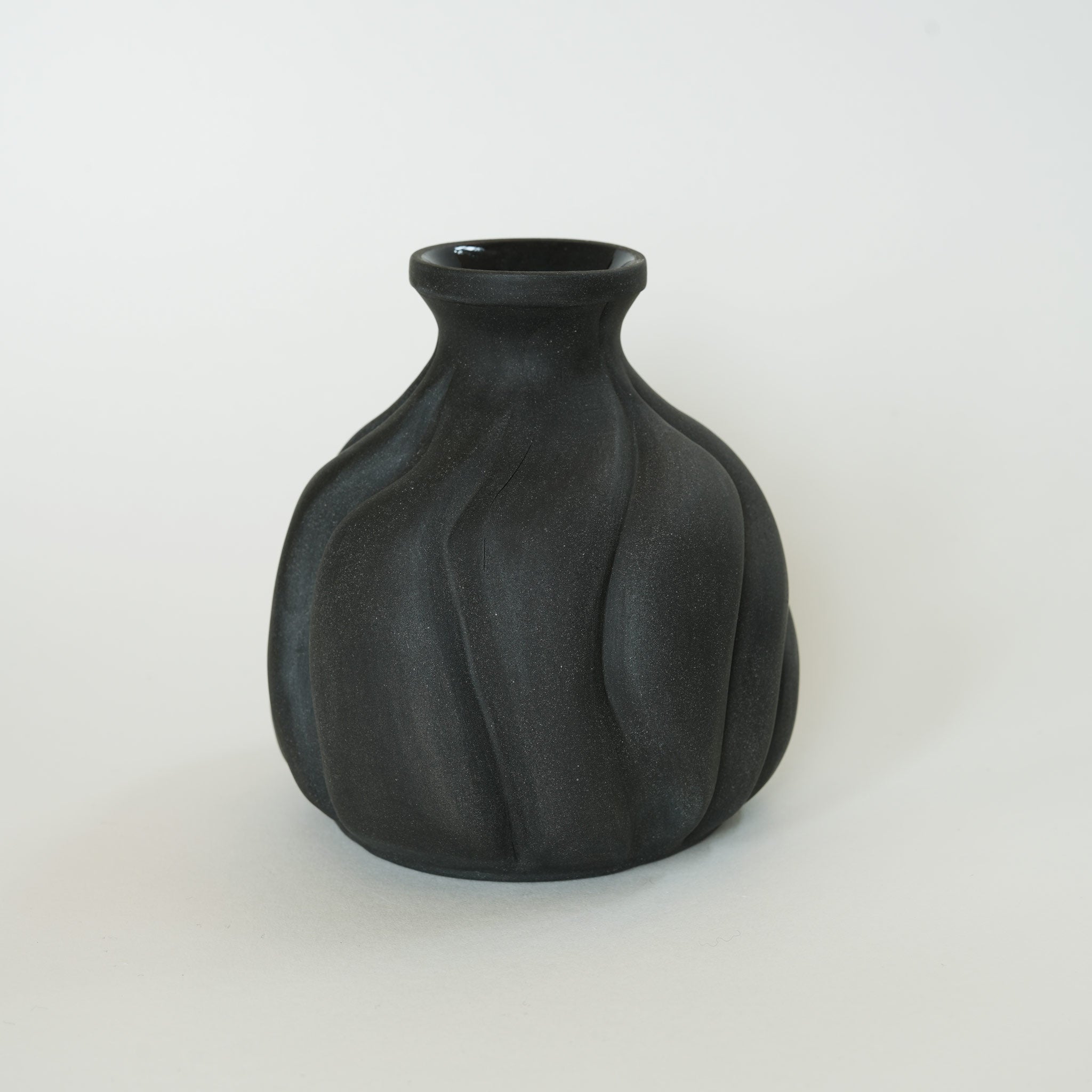 Carved Black Porcelain Vase